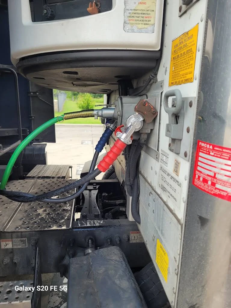 Truck air lines connected below the cab